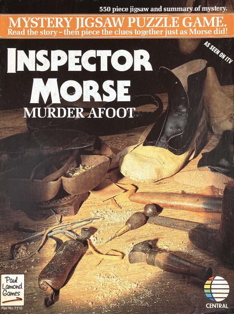 A close-up photograph of a cobbler's workbench featuring a boot, various hand tools, and wood shavings.