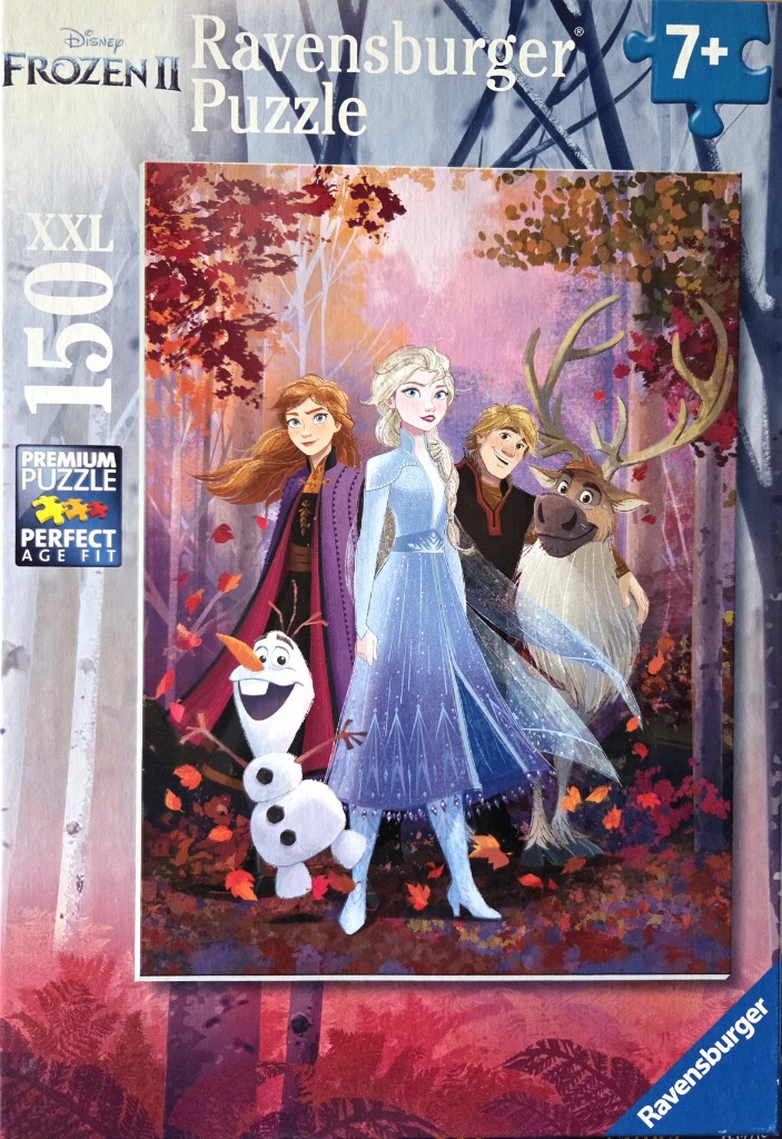 Elsa, Anna, Kristoff, Sven, and Olaf standing in an autumnal forest.