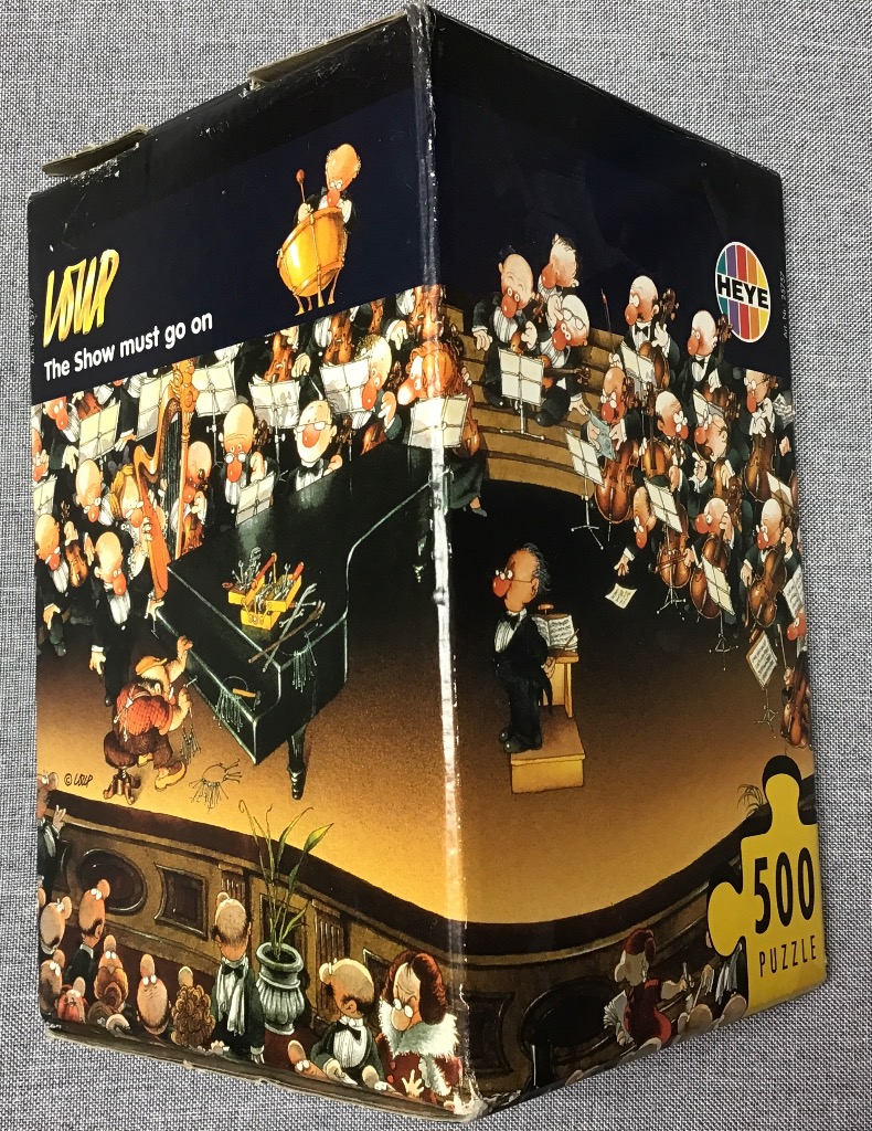 Cartoon illustration of a chaotic orchestra with a repairman fixing a grand piano on stage.