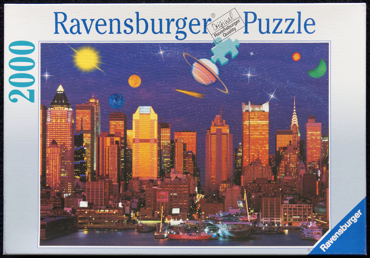 New York City skyline at night with planets and stars in the sky
