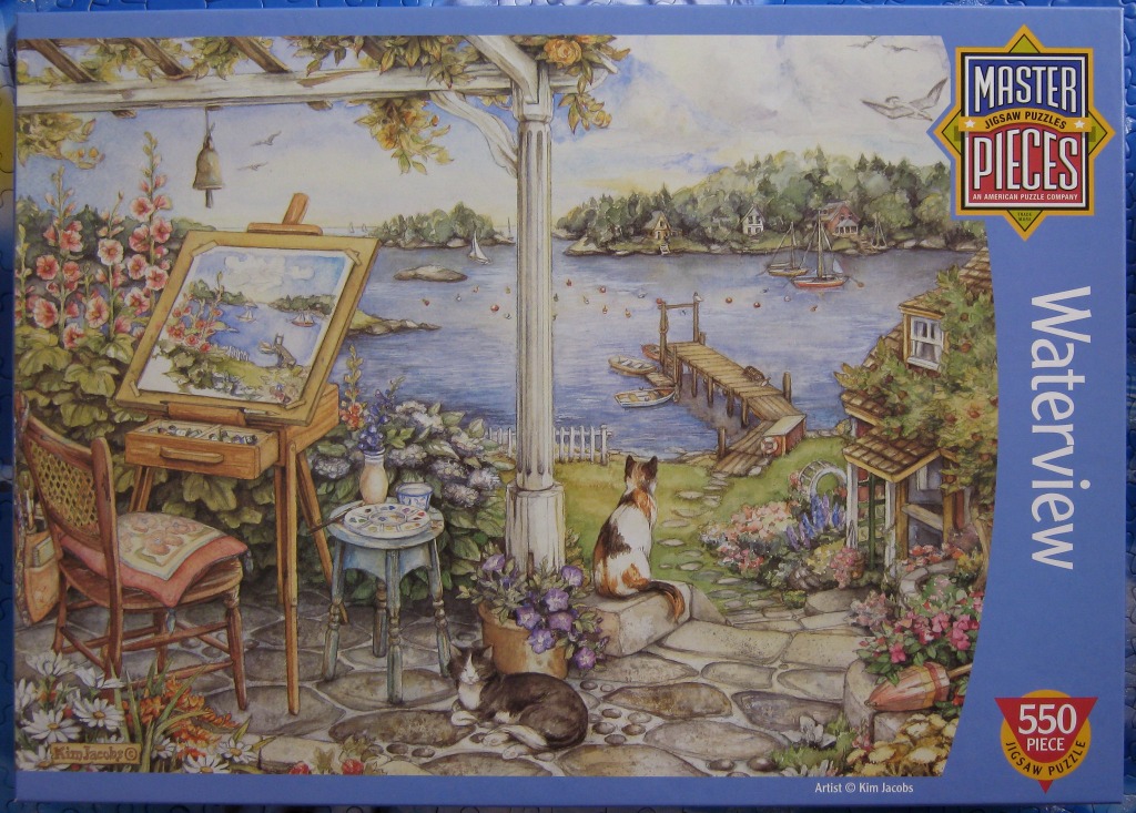 An artist's easel and two cats overlooking a serene harbor scene at sunset.