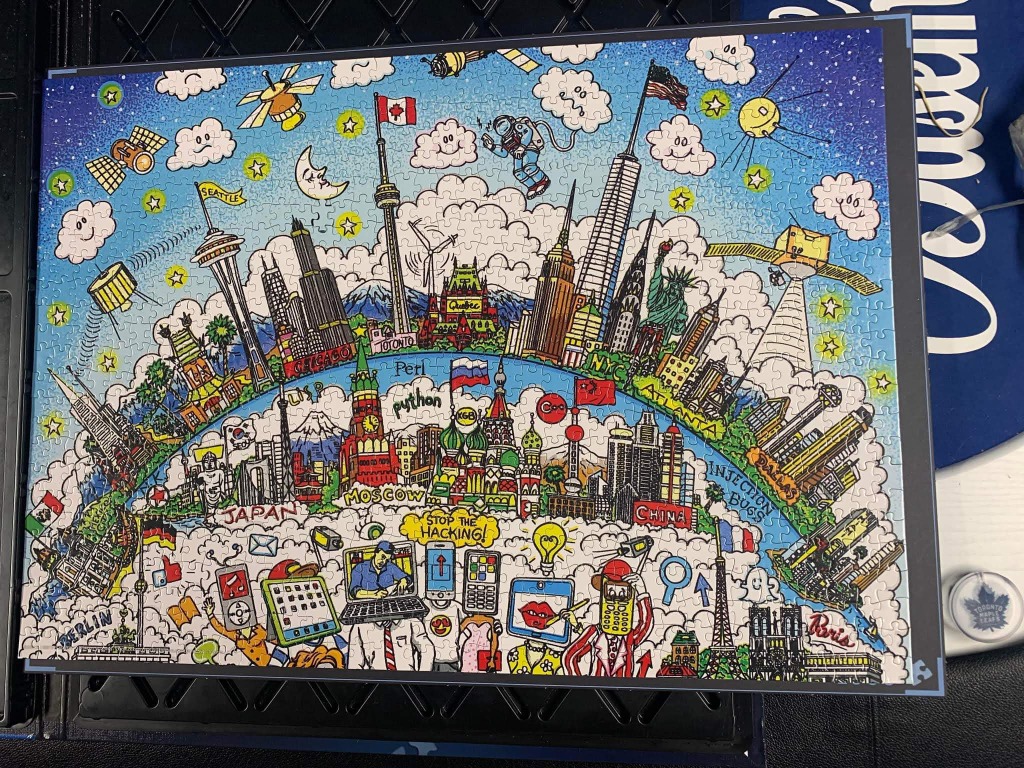 A cartoon illustration of global cities and technological icons arranged in a globe-like composition against a space backgrou