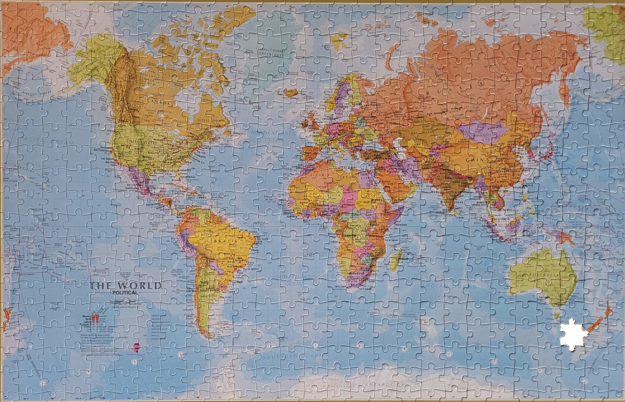 A detailed political world map with soft, pastel-toned continents against a pale blue ocean background.