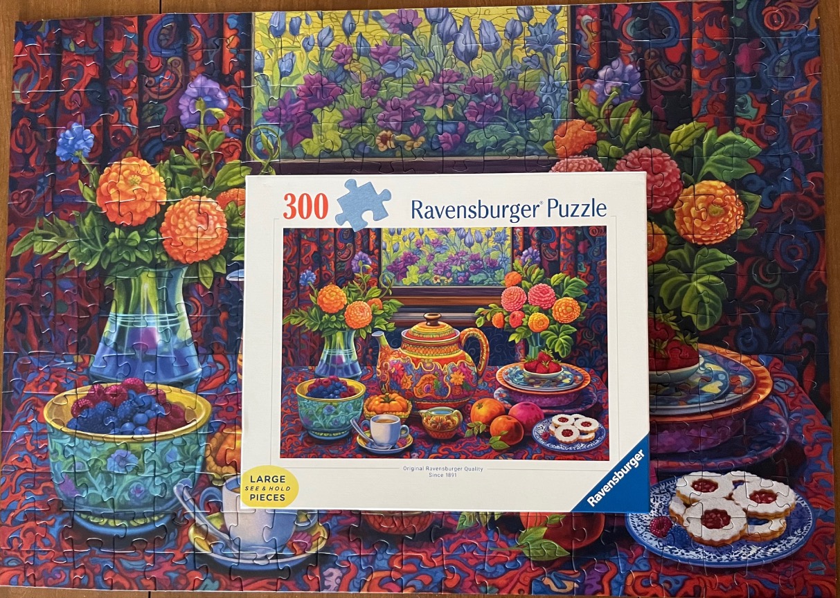 An impressionistic still life painting of a vibrant, colorful tea setting with flowers and fruit.