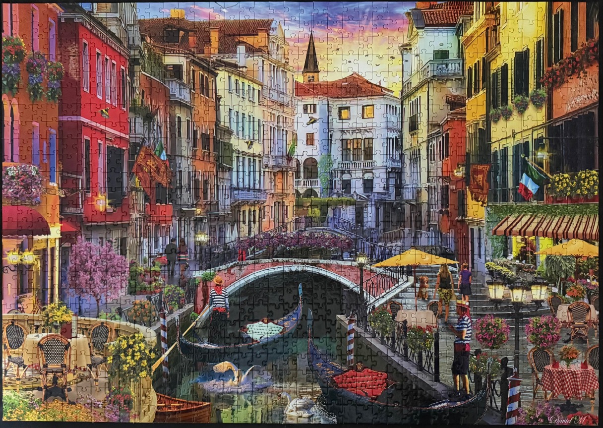 A vibrant, painterly scene of a Venice canal at sunset featuring gondolas, historic buildings, and outdoor dining.