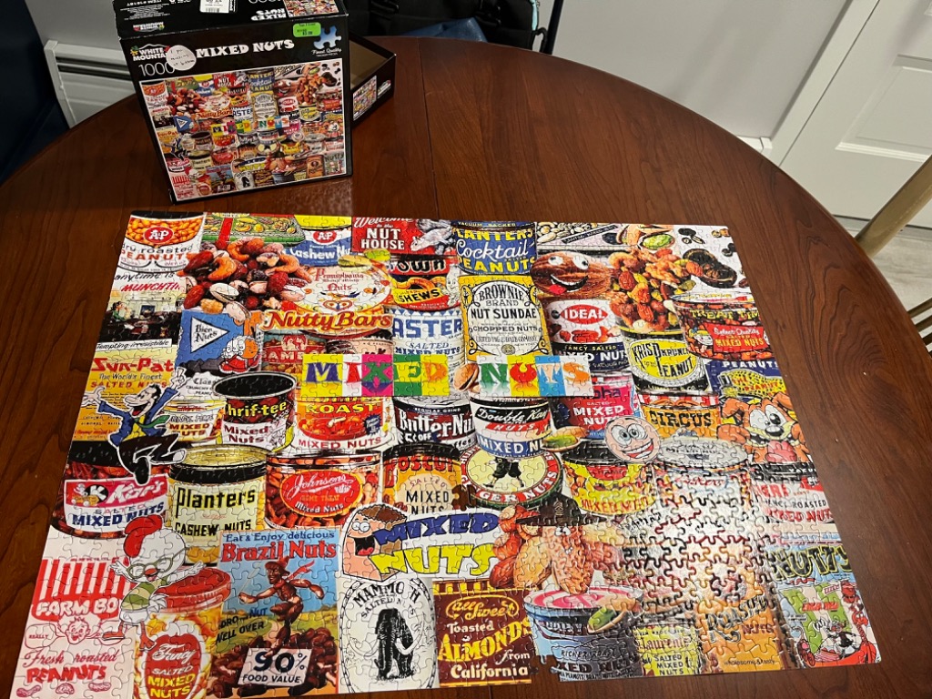 A collage of vintage-style advertisements and can labels for various brands of mixed nuts and snacks.