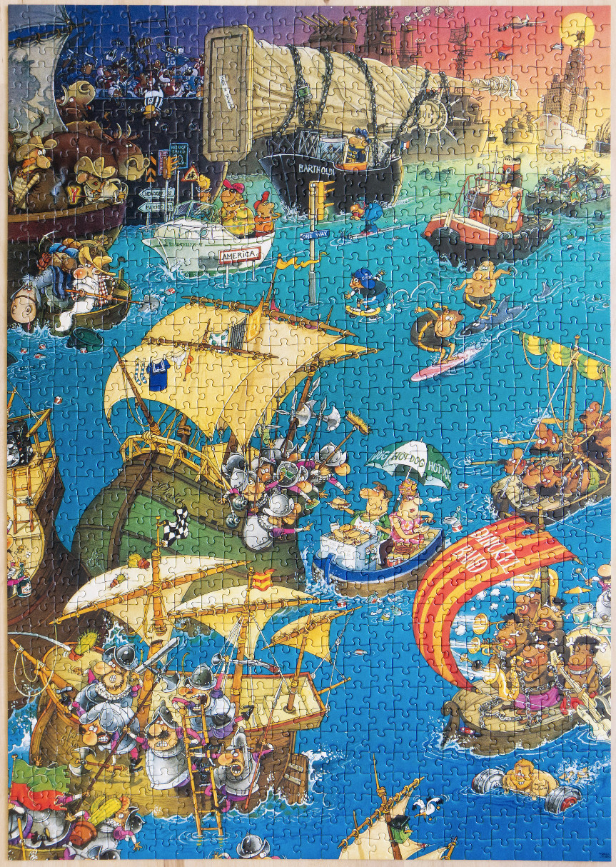 A busy cartoon illustration of various historical and contemporary boats crowded on a bright blue sea.
