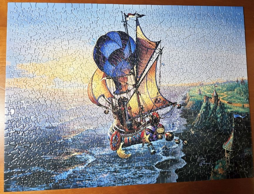 A whimsical flying ship sails over a coastline at sunset in this fantastical illustration.