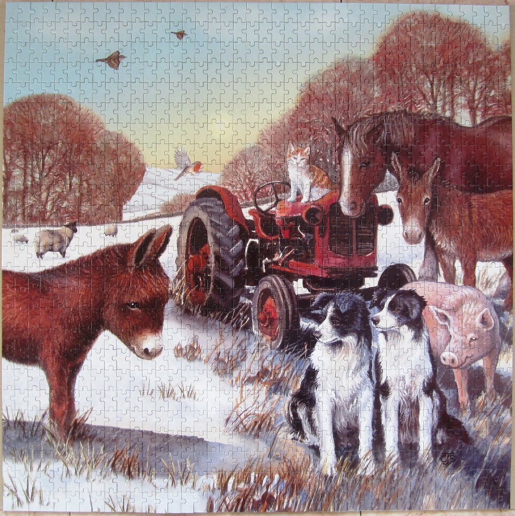 A red tractor surrounded by farm animals in a snowy winter landscape with trees in the background.