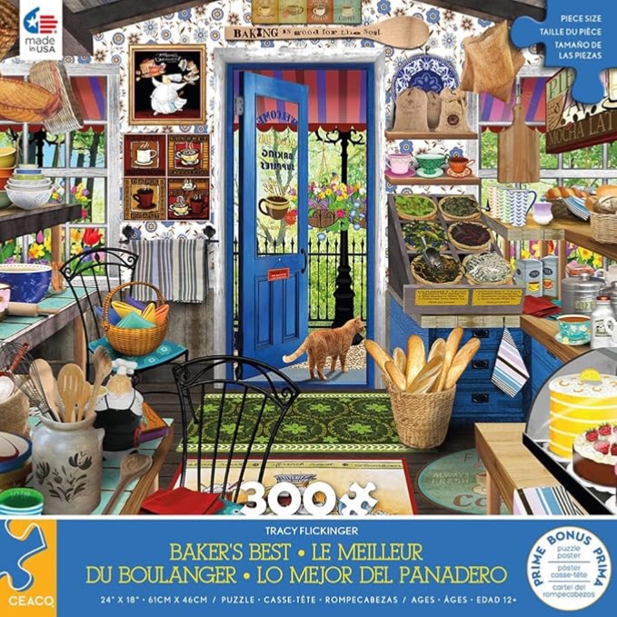A cozy bakery interior with a bright blue door opening to a garden, an orange cat, fresh bread, and kitchen supplies.