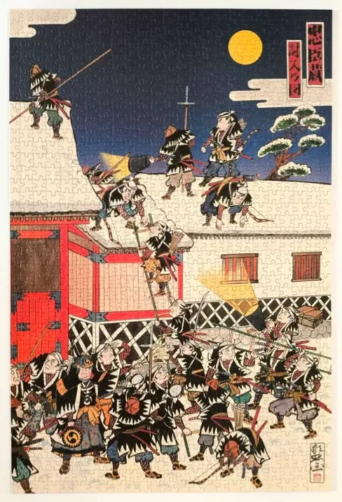 A Japanese woodblock-style print of a 47 Ronin raid scene with samurai at night.