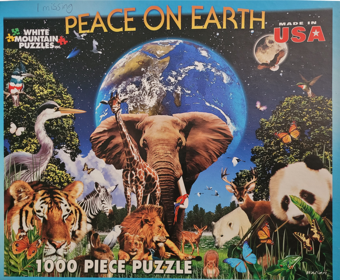 A collage of diverse wild animals against a backdrop of a glowing Earth in space.