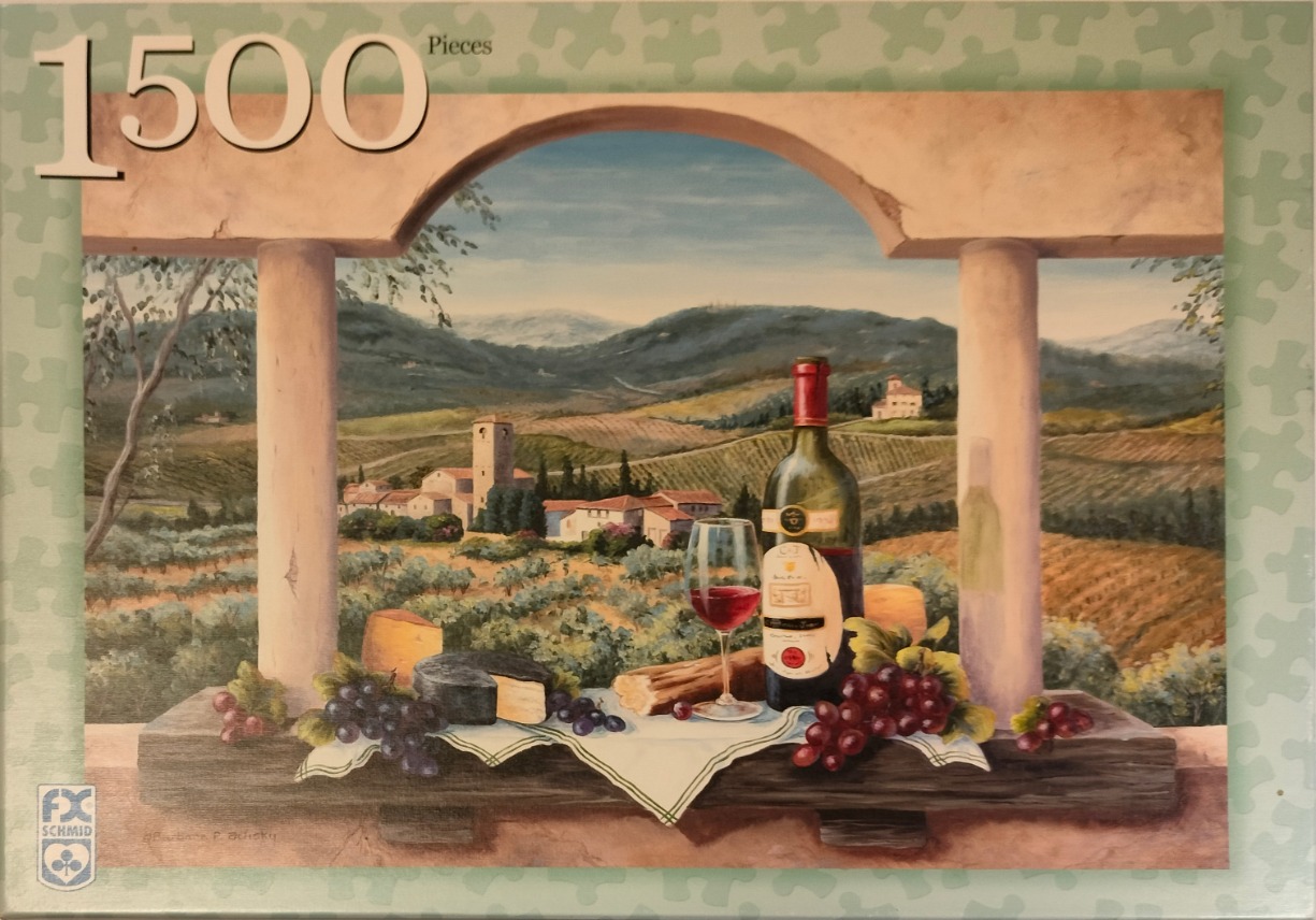 A Tuscan landscape seen through a stone archway, with a still life of wine, grapes, cheese, and bread in the foreground.