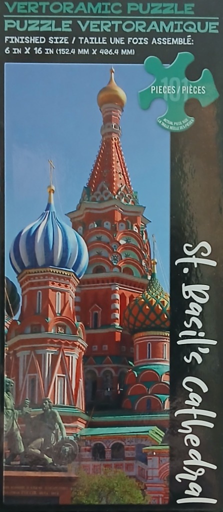 St. Basil's Cathedral in Moscow with its iconic colorful onion domes under a clear blue sky.