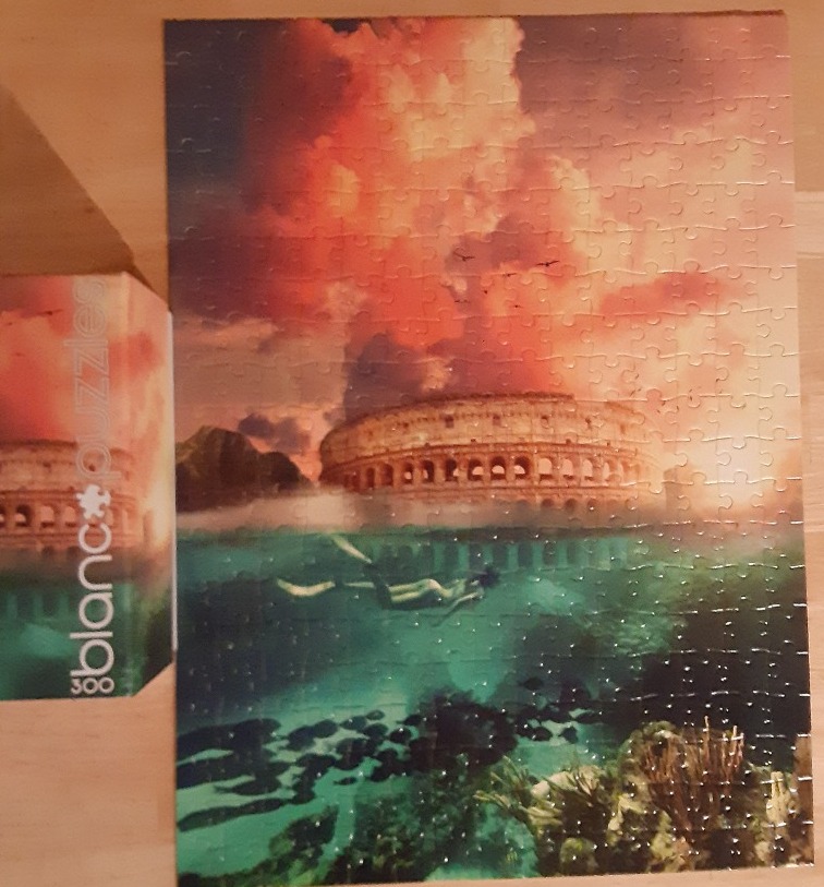 A surreal illustration of the Roman Colosseum partially submerged in a tropical ocean with a swimmer below the surface.