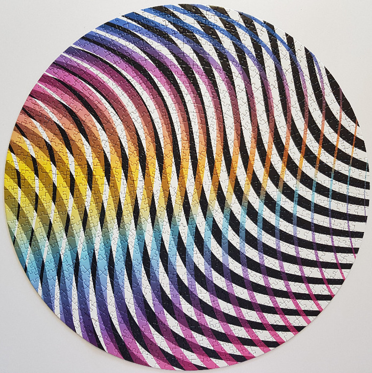 Circular optical art design with spiraling black stripes over a rainbow gradient background.
