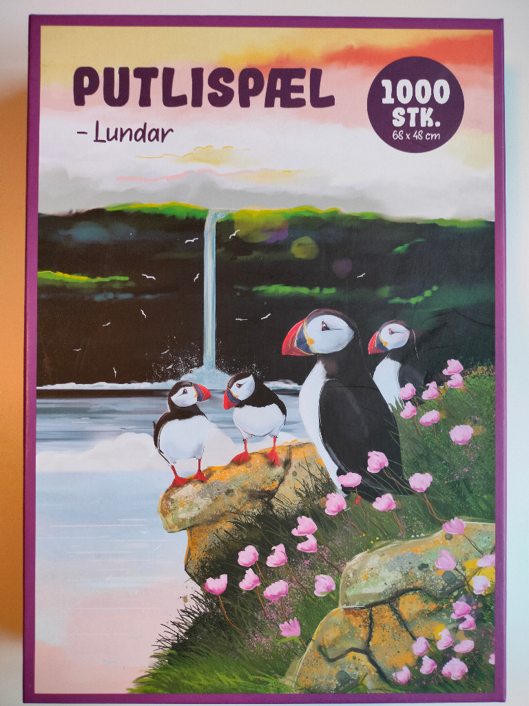 A whimsical illustration of a group of puffins on a rocky cliff overlooking a waterfall at sunset.