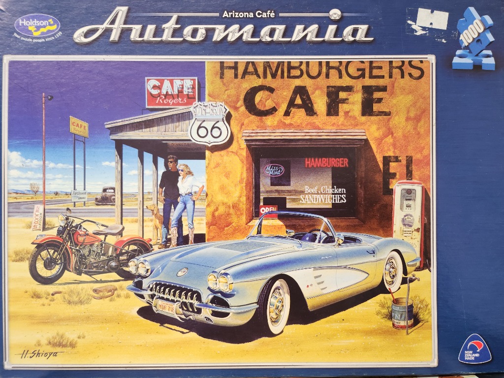 Vintage illustration of a blue convertible, a motorcycle, and a couple at a dusty Route 66 diner in Arizona.