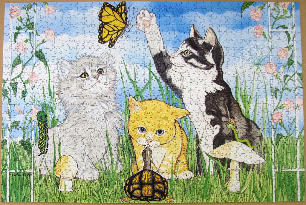 Three kittens exploring a garden with a tortoise, a butterfly, and a caterpillar.