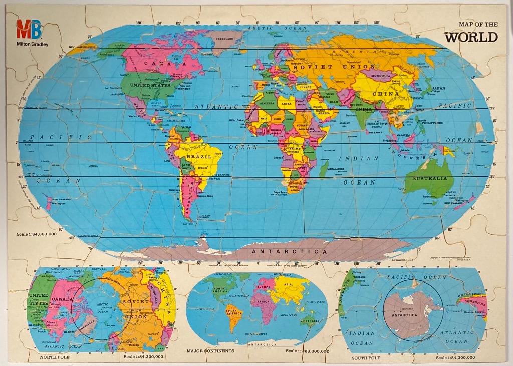 Vintage world map with political boundaries and inset polar projections.