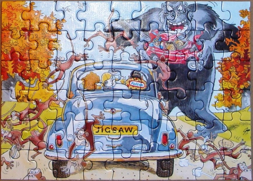 A cartoon gorilla and monkeys around a classic blue car in an autumn setting.