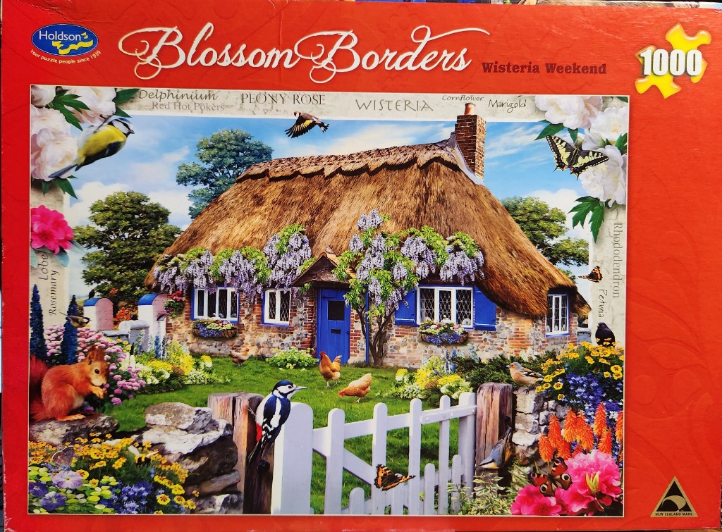 A thatched cottage with a blue door surrounded by lush gardens, wisteria, and various birds and animals.