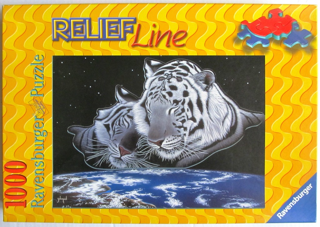 Two white tigers appearing to float in space above a view of the glowing blue Earth.