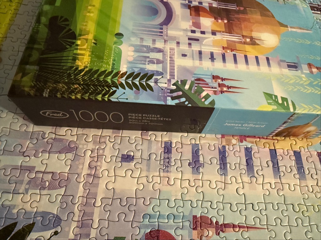 Colorful abstract art puzzle with tropical foliage and futuristic structures.