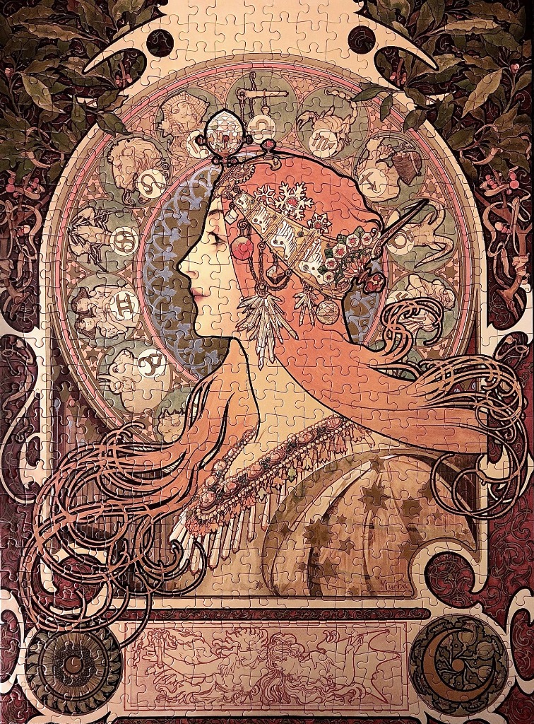 Art Nouveau style illustration of a woman in profile surrounded by a zodiac circle.