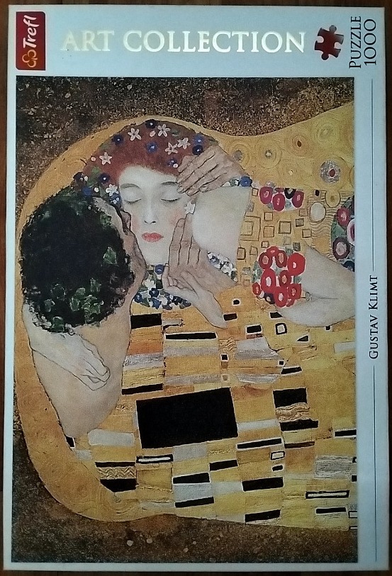 Gustav Klimt's painting The Kiss, depicting a man and woman embracing in an ornate, golden setting.
