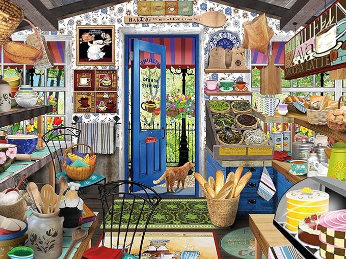 Cozy interior of a quaint bakery with a bright blue door, pastries, and a cat