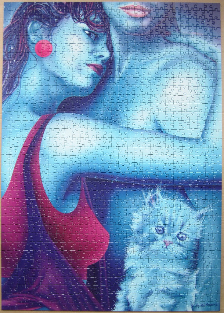 A surreal illustration of a woman in profile and a kitten, both rendered in varying shades of blue with magenta accents.