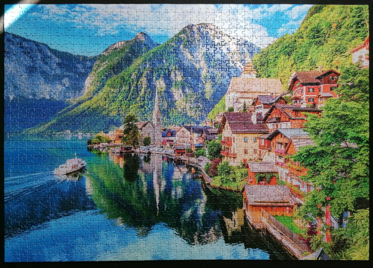 Scenic view of Hallstatt village by a mountain lake in Austria