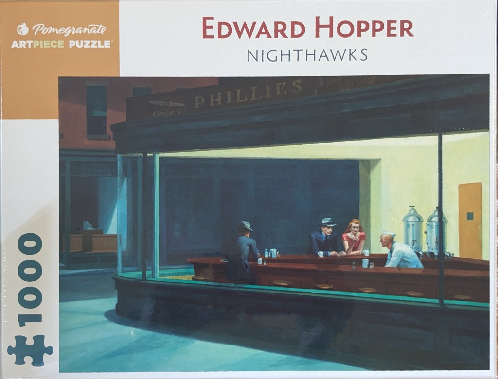 A famous painting of a brightly lit diner late at night with four people inside, set against a dark city street.