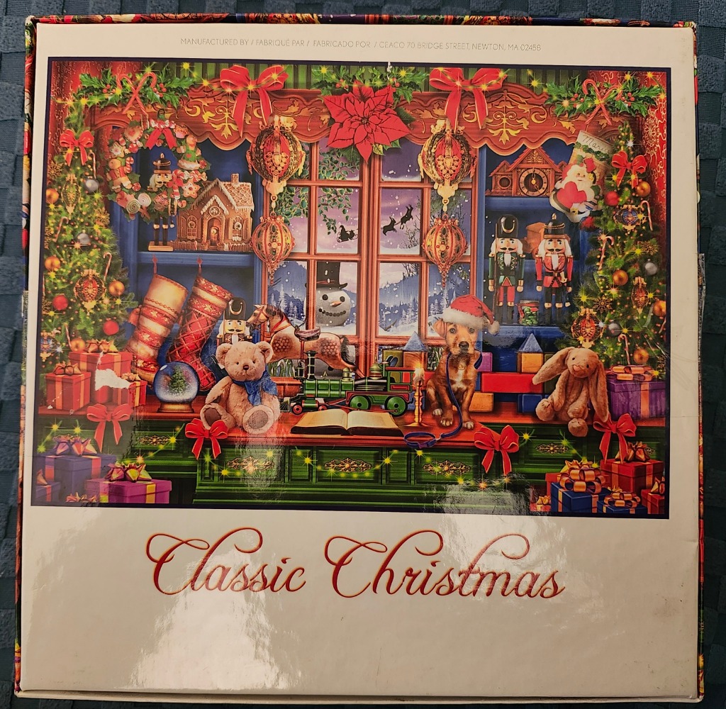 A cozy holiday room with a puppy, teddy bear, toy train, and Christmas decorations viewed through a window.