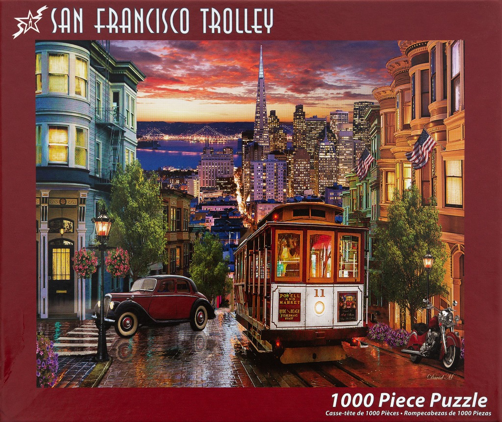 A vintage cable car on a San Francisco street at twilight with city skyscrapers in the background.