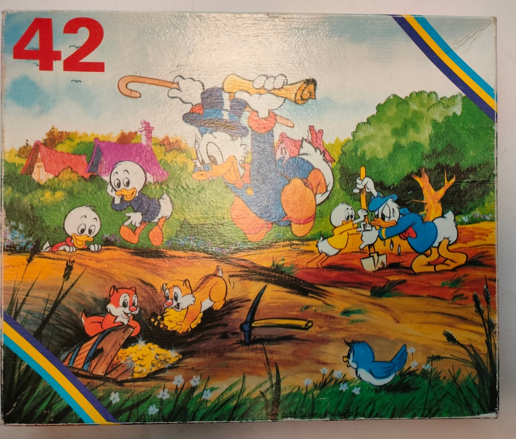 Scrooge McDuck, Donald Duck, and the nephews digging for gold in a countryside setting