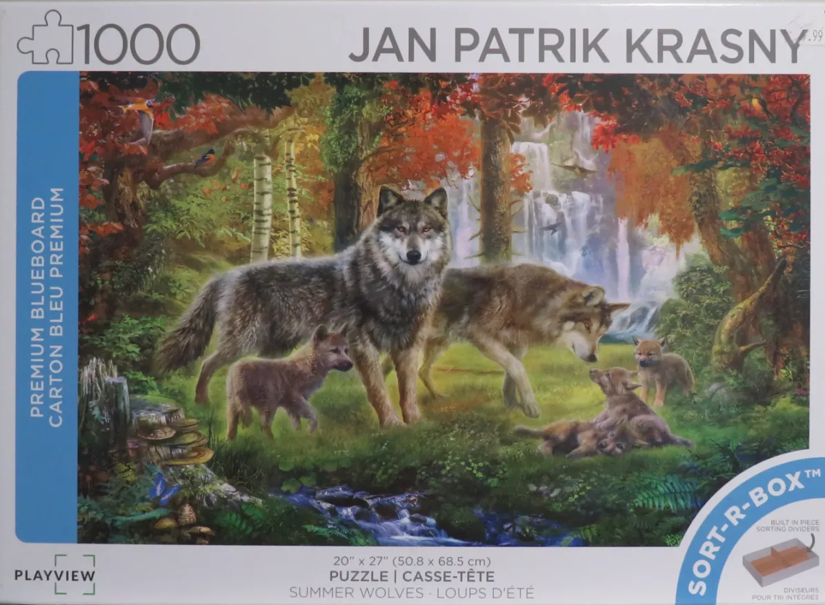 A wolf family in a lush forest with a waterfall in the background.