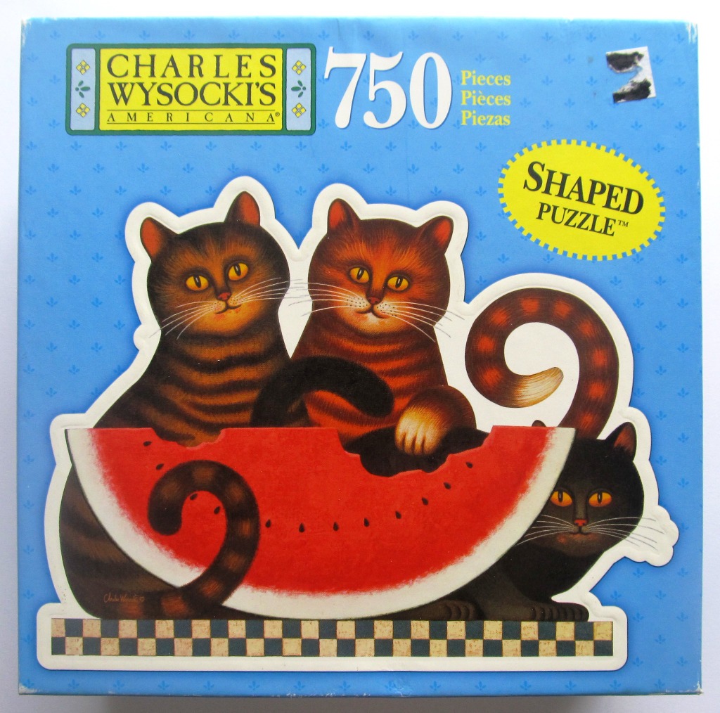 Three cats interacting with a large watermelon slice on a checkered floor.