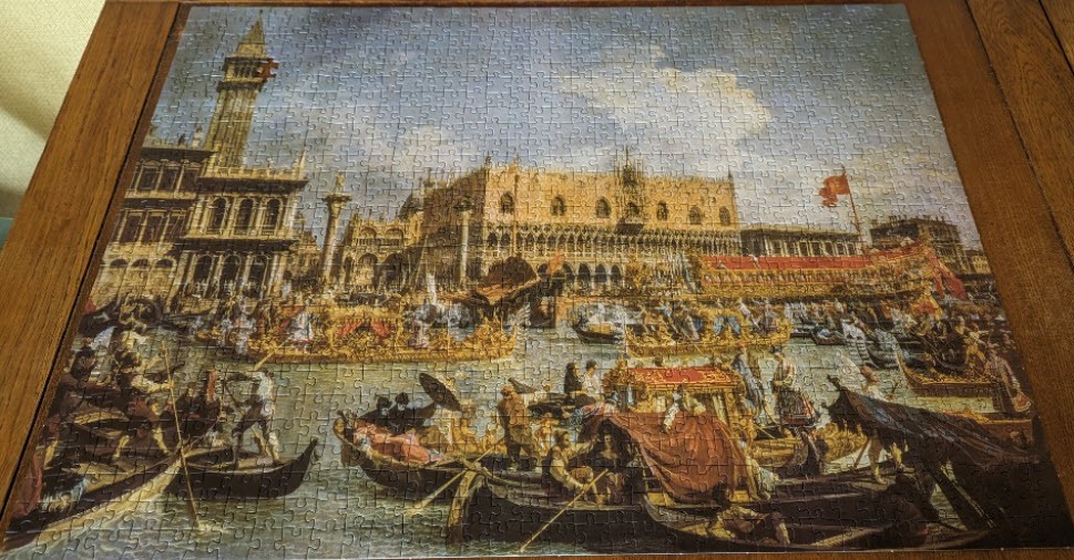 A classical oil painting depicting a grand maritime procession on the Venetian lagoon near the Doge's Palace.