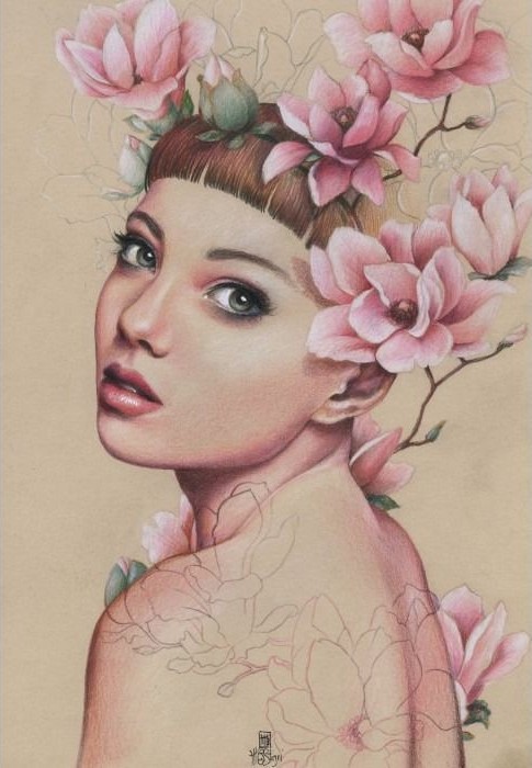 Portrait of a woman with short bangs adorned with soft pink magnolia blossoms against a tan background.