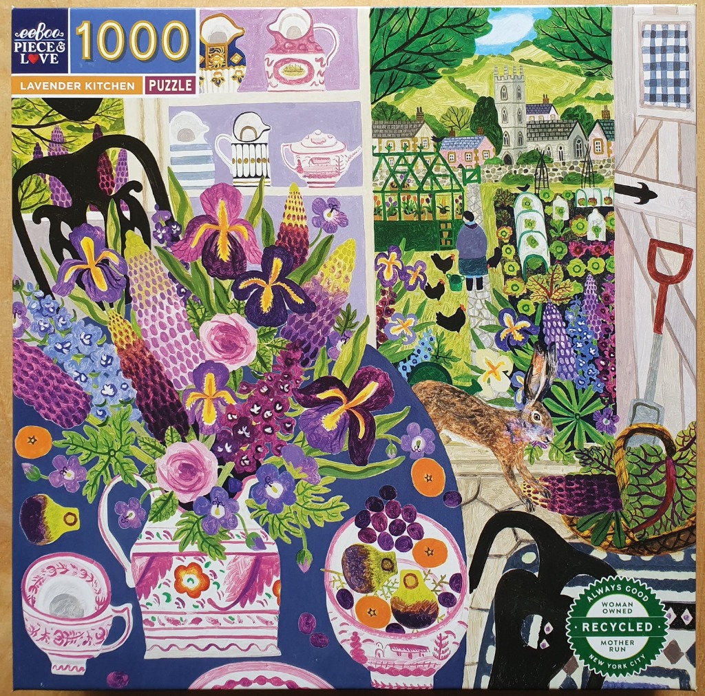 A painting of a kitchen table with flowers overlooking a lush English country garden.