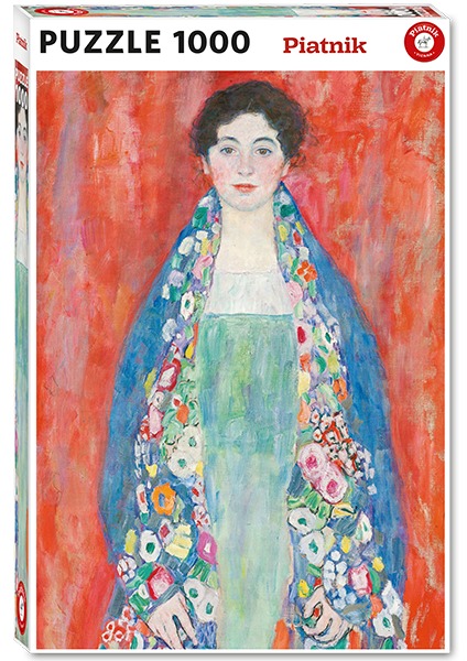 Portrait of a young woman with dark hair wearing a patterned blue shawl against a bright red background.