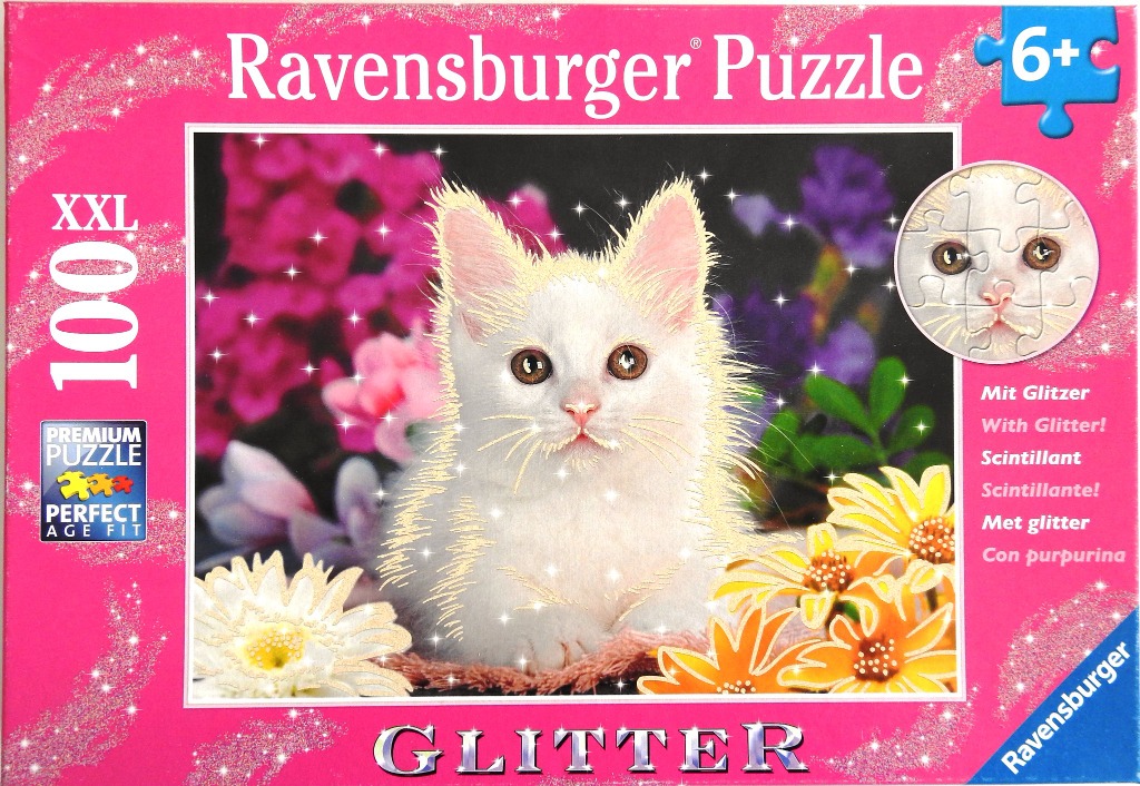 A fluffy white kitten sitting in a garden of colorful flowers with a sparkling glitter effect.