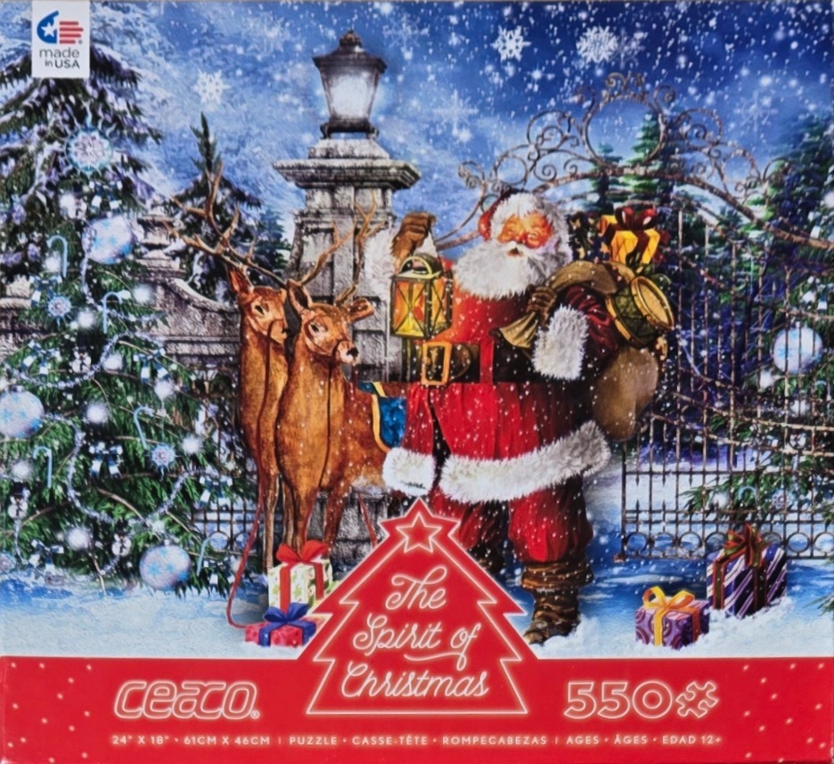 Santa Claus standing with two deer at an ornate garden gate in a snowy Christmas scene