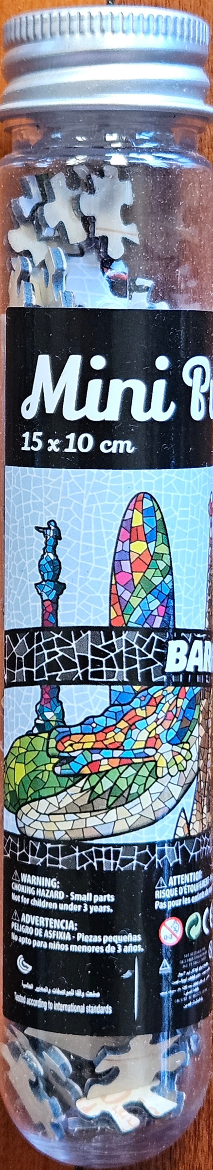 A mosaic-style illustration featuring architectural landmarks and a stylized dragon inspired by Park Güell in Barcelona.