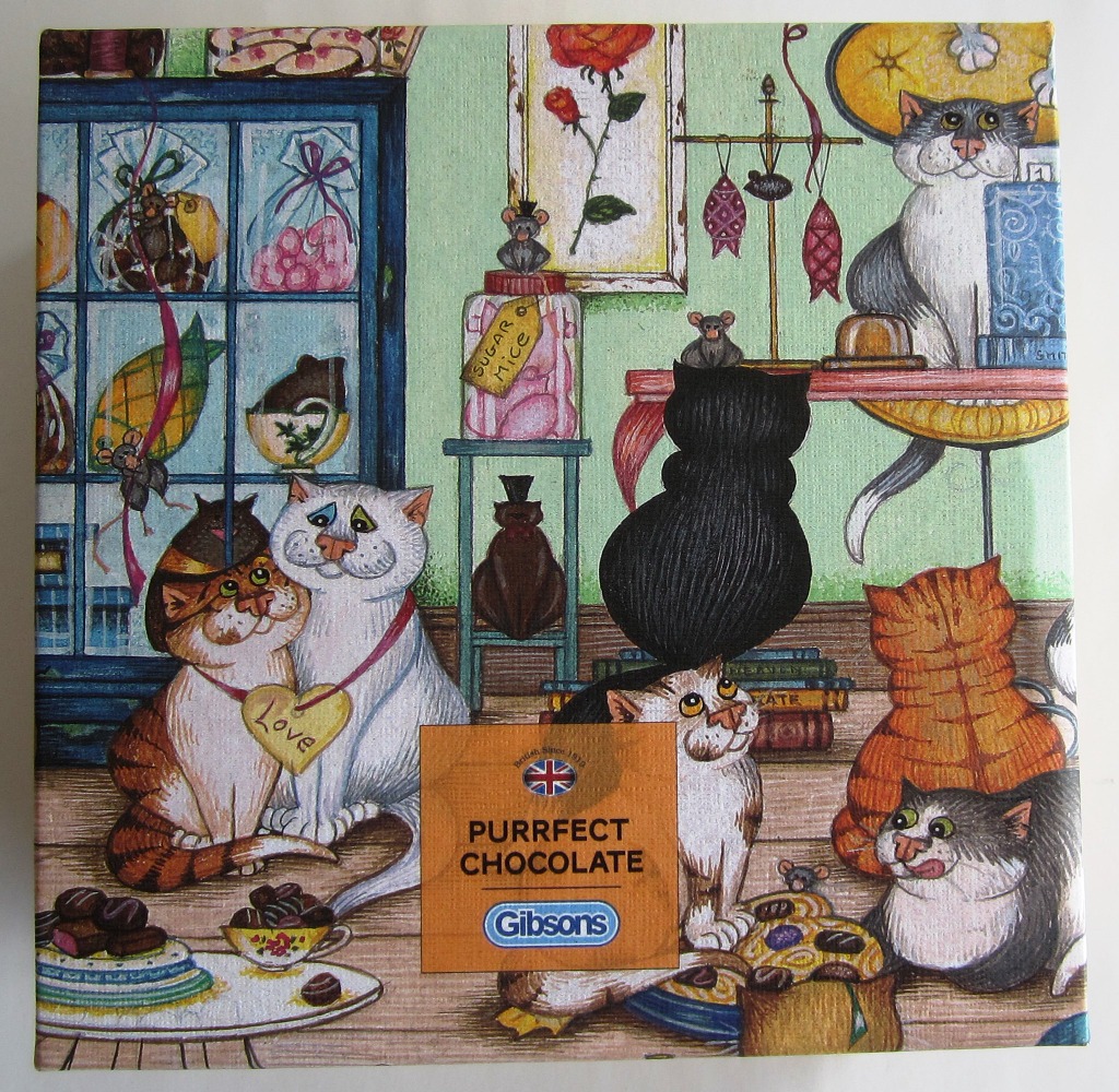 Whimsical illustration of numerous cats in a chocolate shop surrounded by sugar mice and confections.