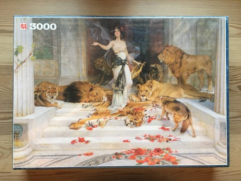 Painting of a woman standing among lions and wolves on a marble staircase, scattered with red flowers.