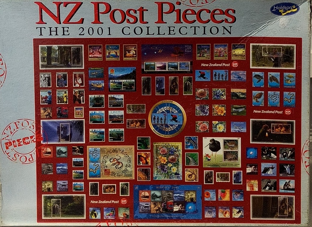 A collage of various New Zealand postage stamps from the year 2001 arranged on a dark red background.