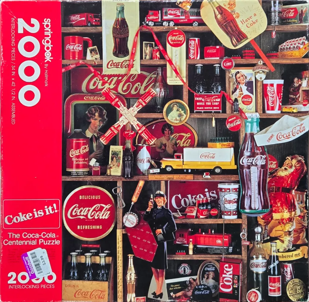 A collage of vintage Coca-Cola advertisements and memorabilia arranged on dark wooden shelving.